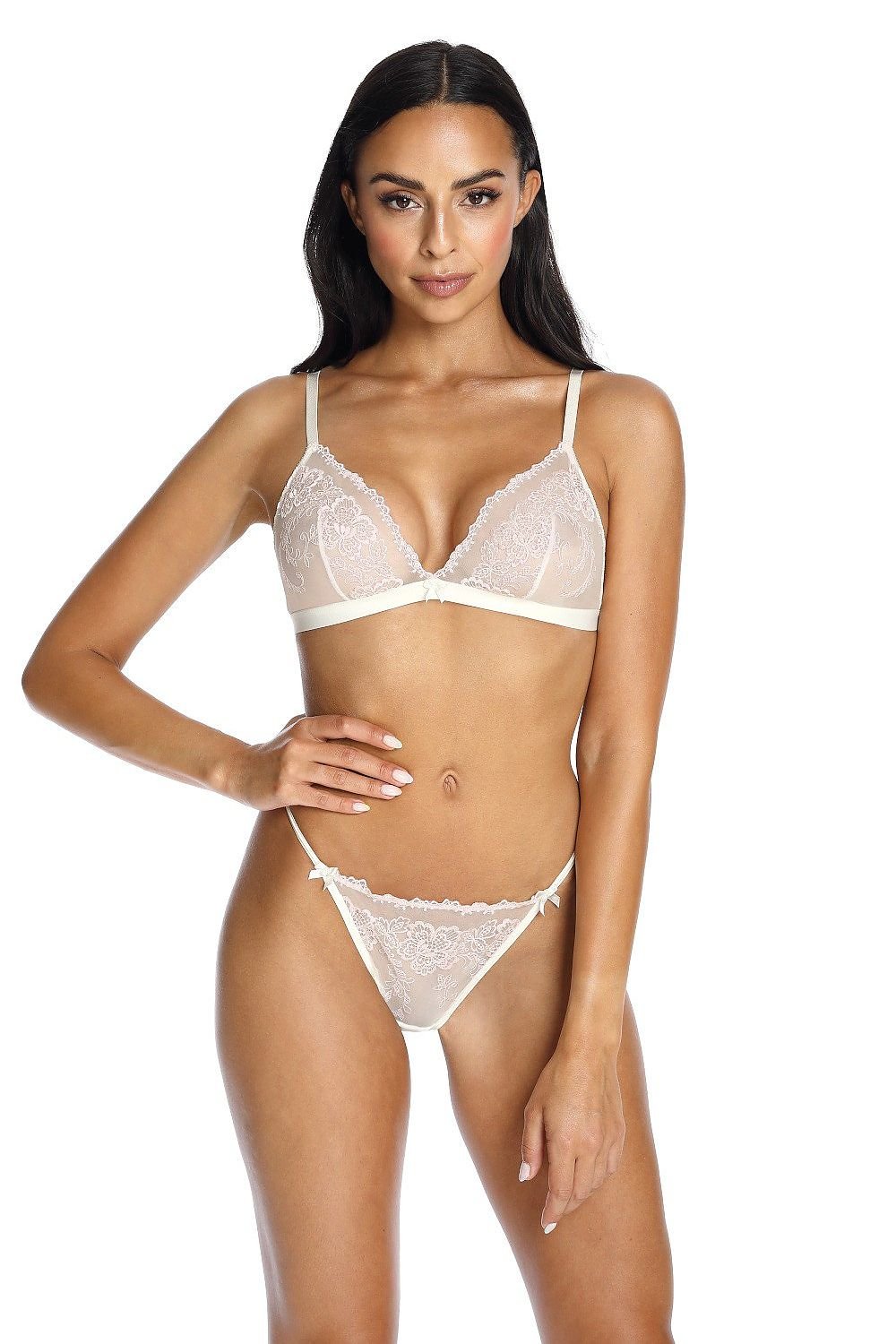 Soutien-gorge élégant blanc sans armature avec broderie florale et bande élastique, idéal pour un maintien confortable et discret.